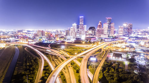 High angle view of illuminated city at night