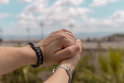 Close-up of woman hand holding hands