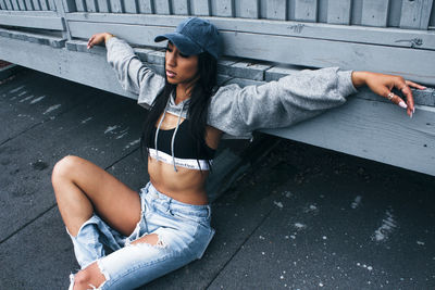 Young woman lying on floor