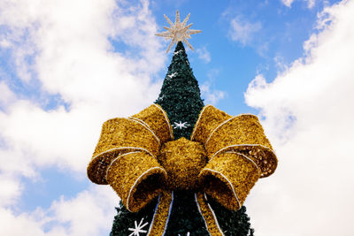 Low angle view of statue against sky