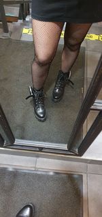 Low section of woman standing at home