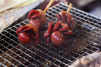 Close-up of meat on barbecue grill