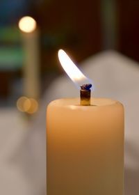 Close-up of lit candle