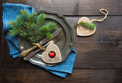 Directly above shot of fruits and leaves on table