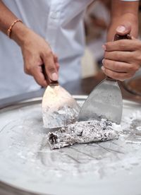 Close-up of man preparing food