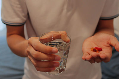 Close-up of man holding ice cream