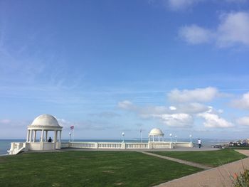 Built structure on beach against sky