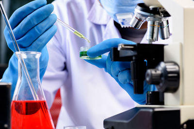 Close-up of scientist working at laboratory