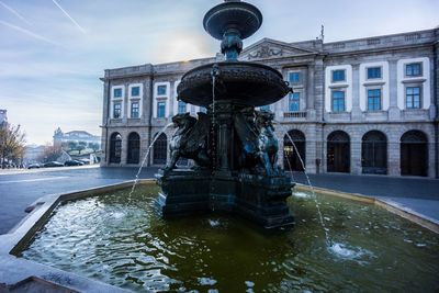 Fountain in front of building