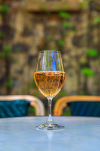 Close-up of wineglass on table