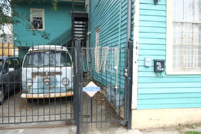 Cars parked by house