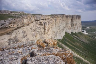 Scenic view of rock formations against sky