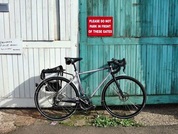 Bicycle parked on road