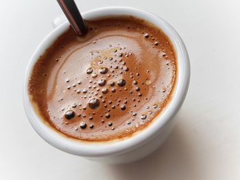 Close-up of cappuccino on table