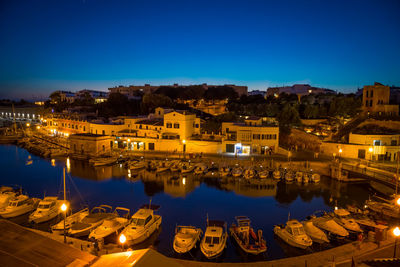 High angle view of illuminated buildings against sky