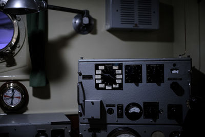 Close-up of old radio station on table at home