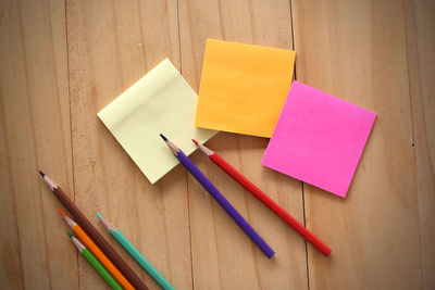 High angle view of colored pencils on table