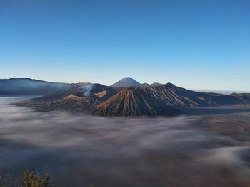 Scenic view of volcanic landscape against sky