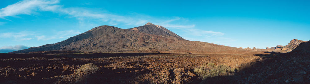 Panoramic view of landscape and mountains against sky