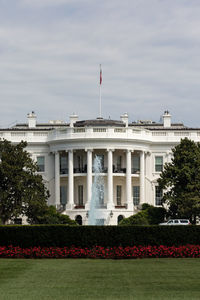 Exterior of white house against sky