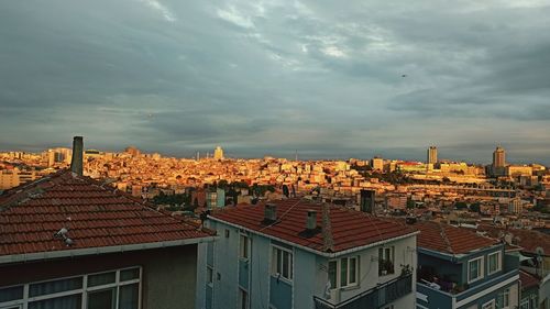 High angle view of townscape against sky during sunset