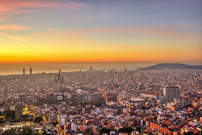 High angle view of townscape against sky during sunset