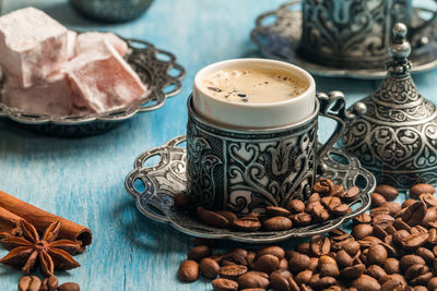 High angle view of coffee cups on table