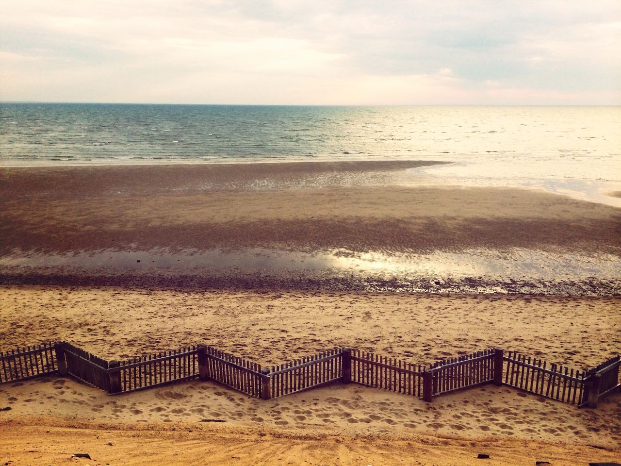 beach, sand, sea, shore, horizon over water, sky, tranquility, tranquil scene, scenics, water, beauty in nature, nature, cloud - sky, vacations, idyllic, day, outdoors, cloud, absence, incidental people