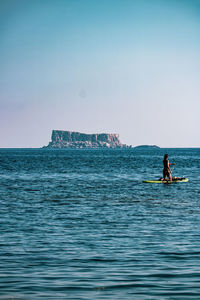 Scenic view of sea against clear sky