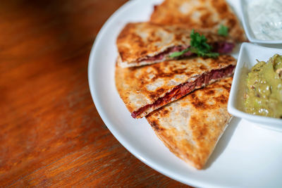 High angle view of breakfast served on table