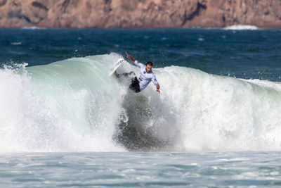 Man surfing in water