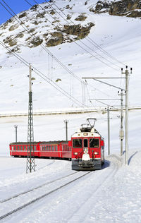 Train on snow covered railroad track