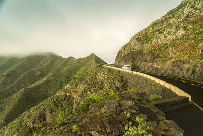 Car on mountain road at el teide near masca in winter