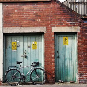 Brick wall with closed door