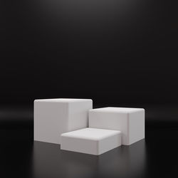 Close-up of white objects on table against black background