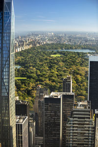 High angle view of buildings in city against sky