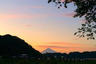 Scenic view of mountains at sunset