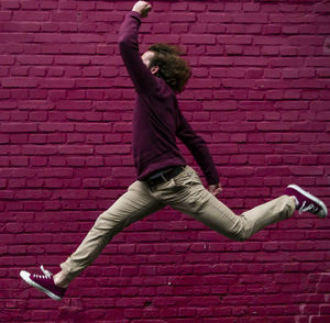 Full length of man jumping outdoors