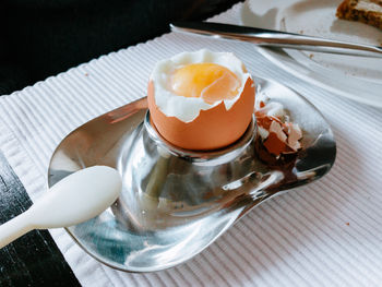 Close-up of eggs for breakfast served on table