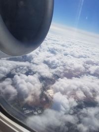 Aerial view of cloudscape seen from airplane window