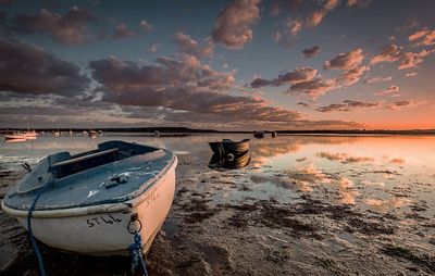 View of calm lake at sunset