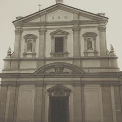 Low angle view of building facade against sky