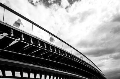 Low angle view of building against cloudy sky