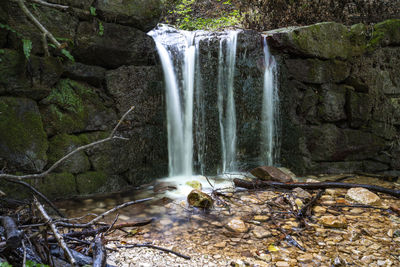 Scenic view of waterfall in forest