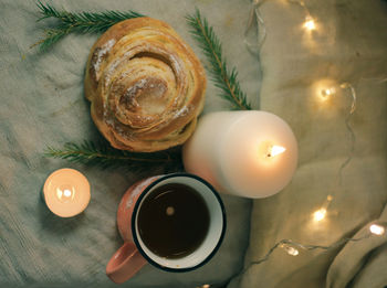 High angle view of tea light candles on table