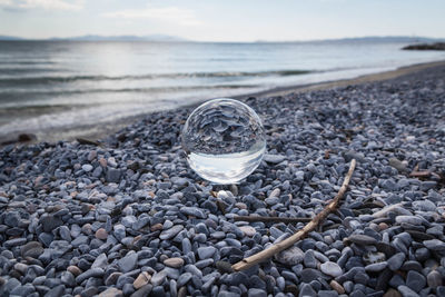 Close-up of stones on beach