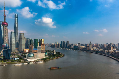 Panoramic view of city and buildings against sky