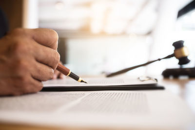 Close-up of man working on table