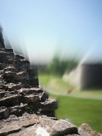 Close-up of rocks against sky