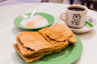 Close-up of breakfast served on table